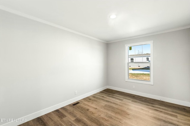 169 Dode St, Sweetwater, TN 37874 - unfurnished room featuring crown molding, baseboards, and wood finished floors