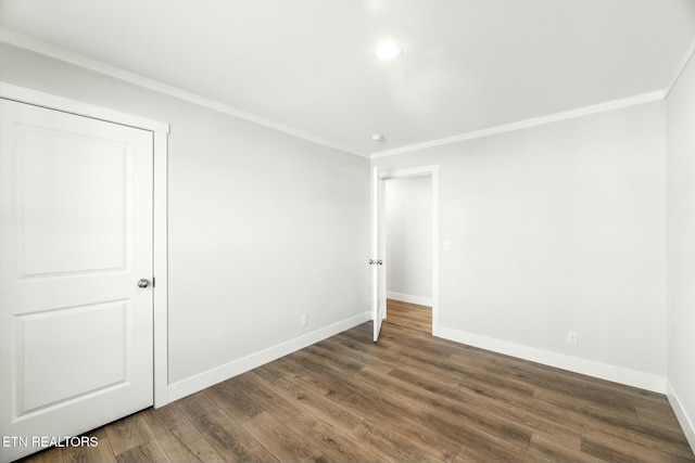 169 Dode St, Sweetwater, TN 37874 - empty room featuring baseboards, wood finished floors, crown molding, and recessed lighting