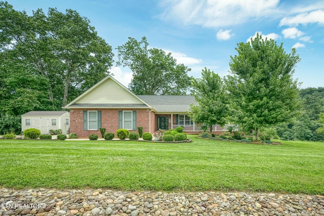 ranch-style house featuring a front yard