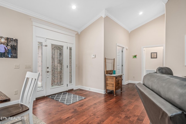 foyer with high vaulted ceiling, dark hardwood / wood-style flooring, and crown molding