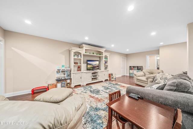 living room featuring dark wood-type flooring