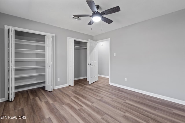 unfurnished bedroom featuring ceiling fan and light hardwood / wood-style flooring