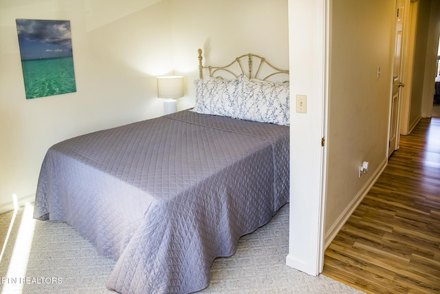 bedroom featuring hardwood / wood-style flooring