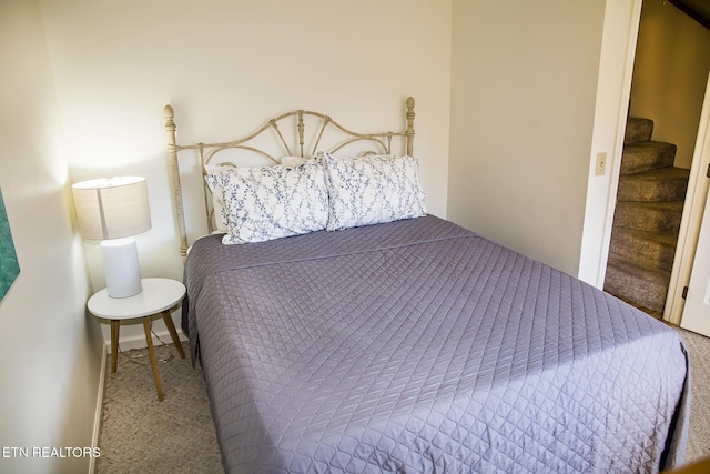 bedroom featuring carpet