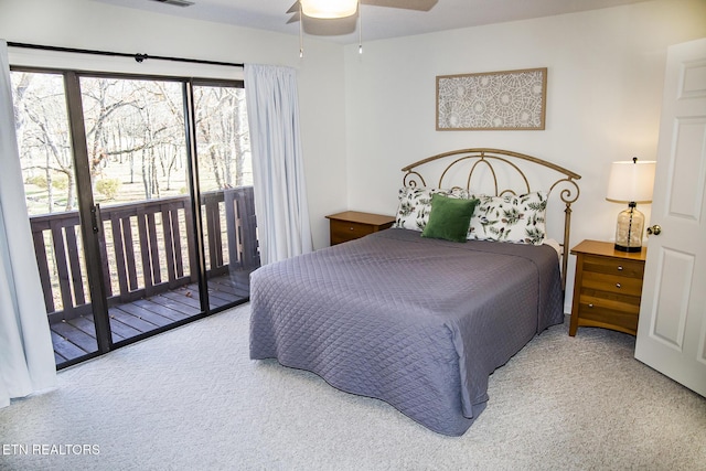 carpeted bedroom featuring access to outside and ceiling fan