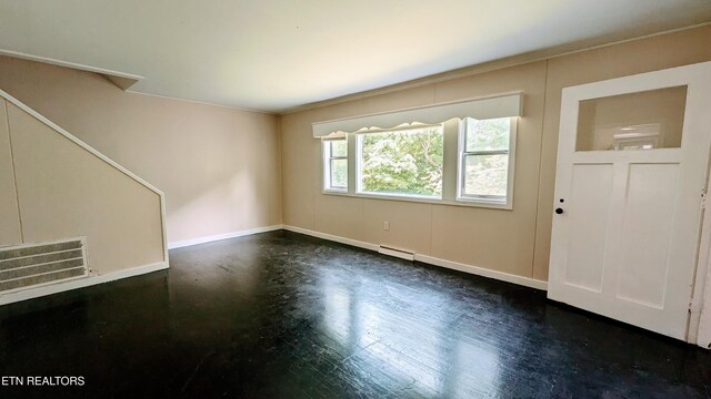 236 Highland Ave, Oak Ridge, TN 37830 - unfurnished living room featuring baseboards