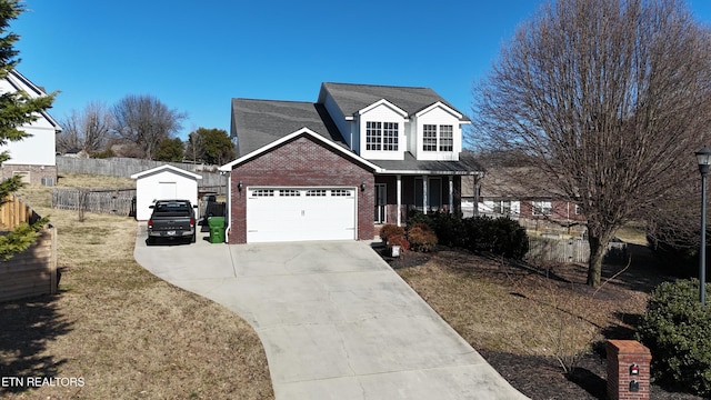 view of front facade with a garage and a front yard