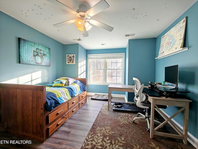 bedroom with wood-type flooring and ceiling fan