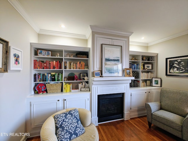 living area with dark wood-type flooring and crown molding