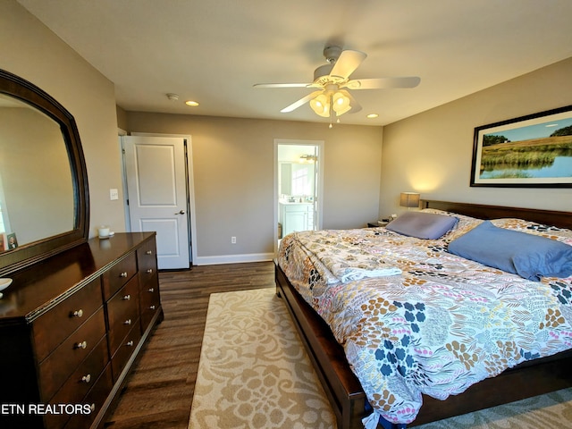 bedroom with dark hardwood / wood-style floors, ceiling fan, and ensuite bathroom