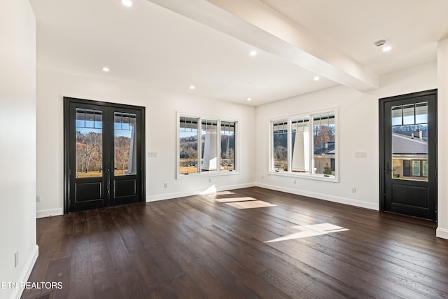 foyer featuring french doors, dark hardwood / wood-style floors, and beam ceiling