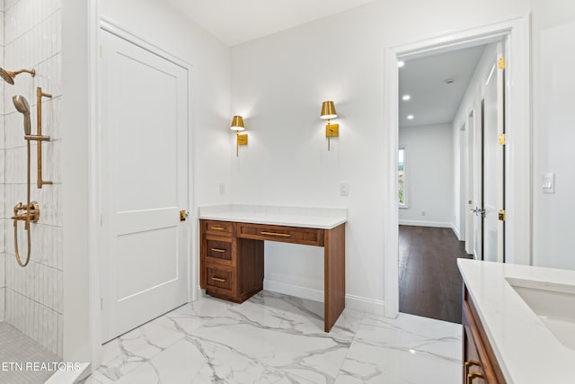 bathroom featuring vanity and walk in shower