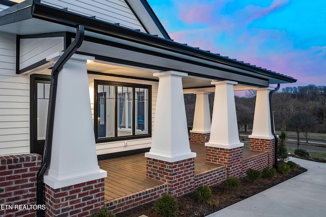 view of property exterior at dusk