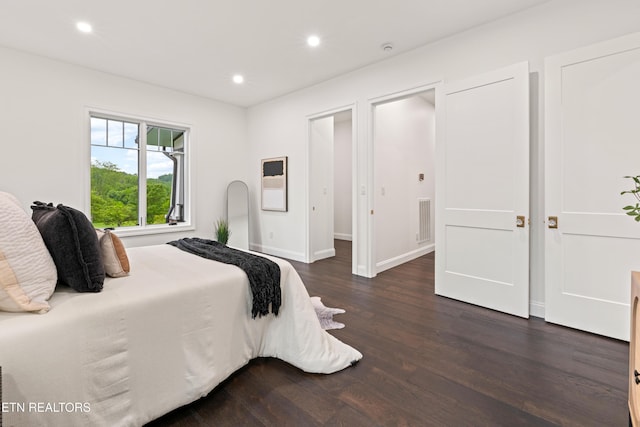 1521 Cherokee Blvd, Knoxville, TN 37919 - bedroom with dark wood-style flooring, recessed lighting, and baseboards