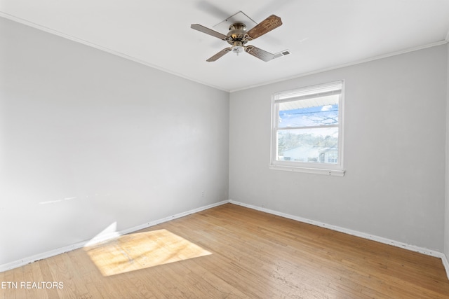 unfurnished room featuring light wood-type flooring, ceiling fan, and crown molding