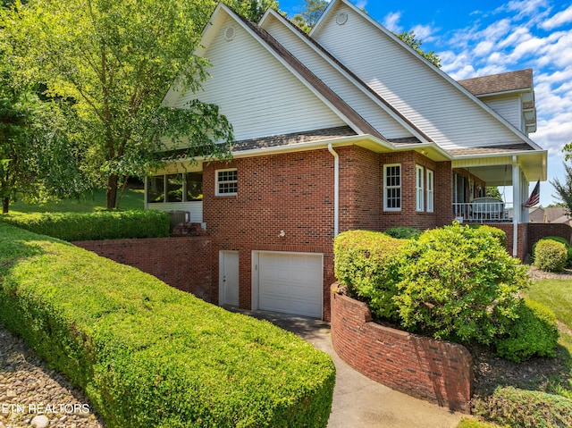 view of property exterior with a garage