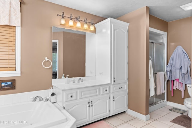 full bathroom with toilet, vanity, tile patterned flooring, plus walk in shower, and a textured ceiling