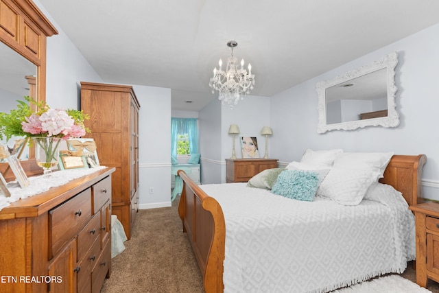 bedroom with a chandelier and carpet flooring