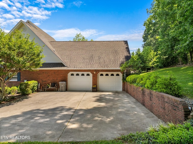 exterior space with a garage