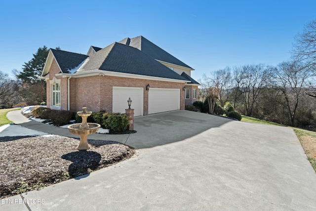 view of side of home with a garage