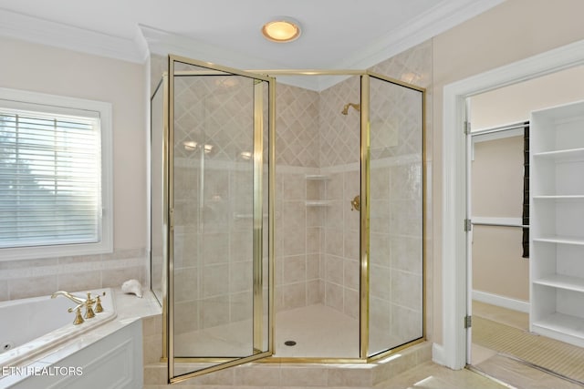 bathroom with tile patterned flooring, ornamental molding, and separate shower and tub