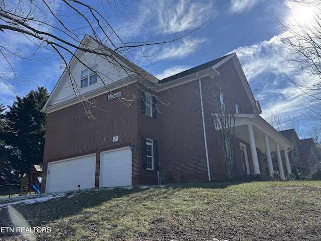 view of home's exterior with a garage