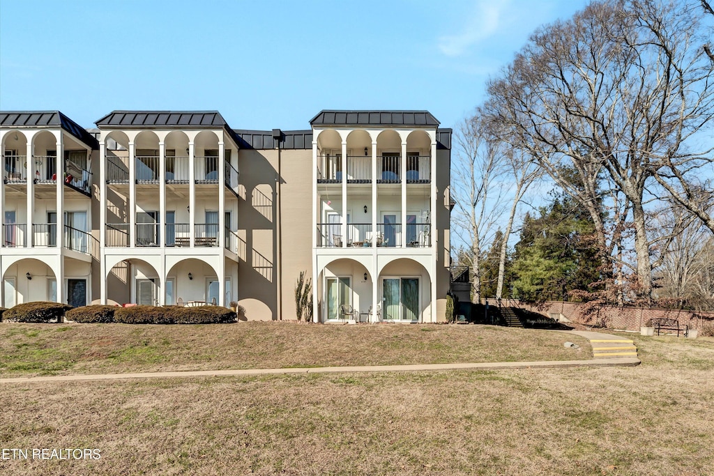 exterior space with a front yard