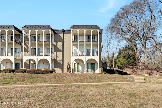 exterior space with a front yard