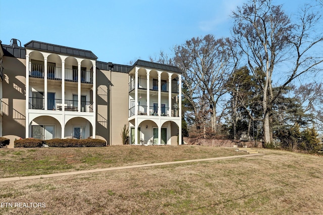 exterior space with a front yard