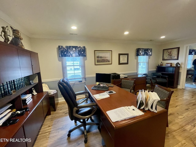 office with crown molding and light wood-type flooring