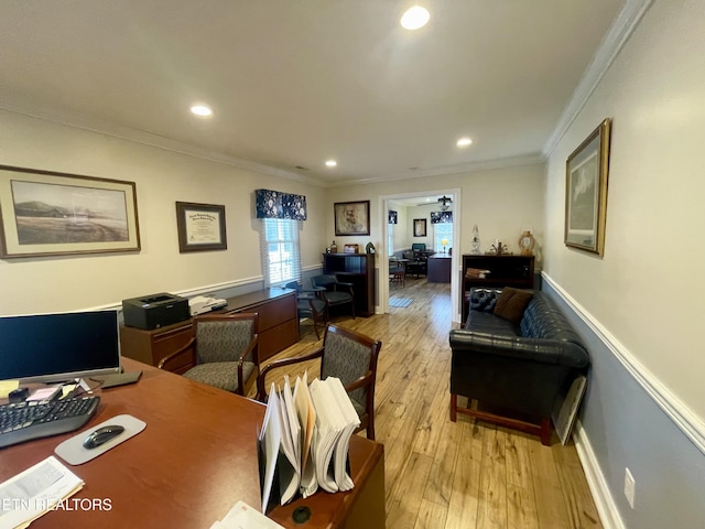 office area featuring crown molding and light hardwood / wood-style flooring