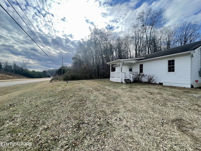 view of yard featuring a porch