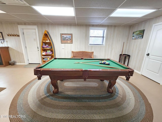 rec room featuring pool table, a drop ceiling, and wooden walls