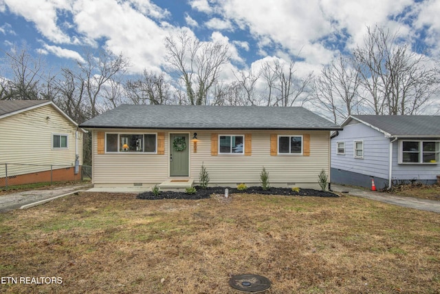 single story home with a front lawn