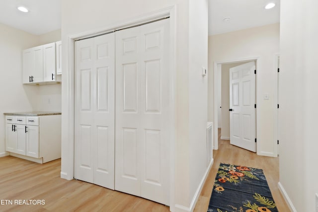 corridor featuring light wood-type flooring