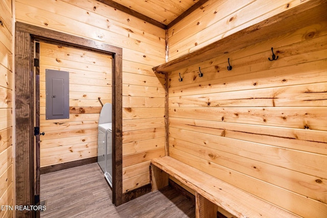 mudroom featuring wooden ceiling, electric panel, dark hardwood / wood-style flooring, and wooden walls