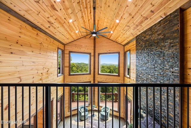 details with ceiling fan, wooden ceiling, and wooden walls