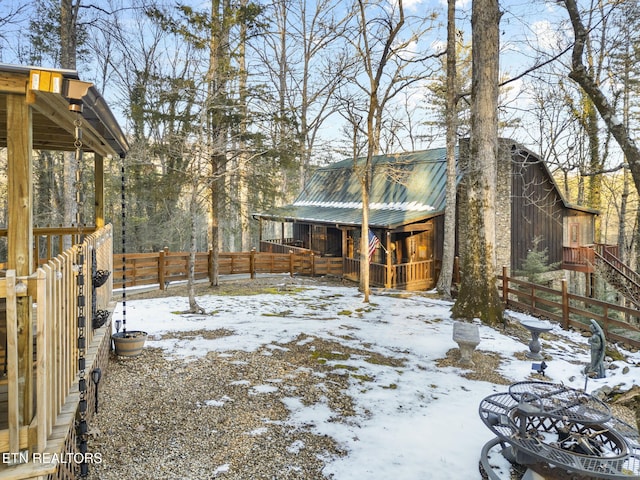 view of yard covered in snow