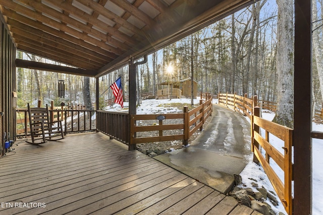 view of snow covered deck