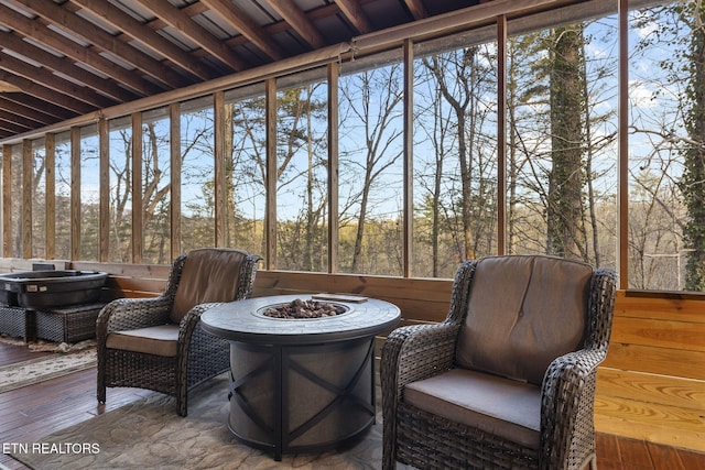 sunroom featuring a healthy amount of sunlight