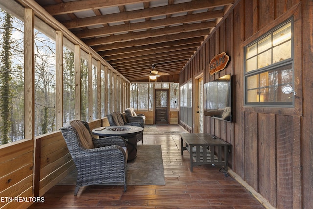 sunroom / solarium with ceiling fan