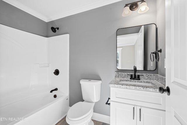 full bathroom featuring vanity, crown molding, tub / shower combination, and toilet