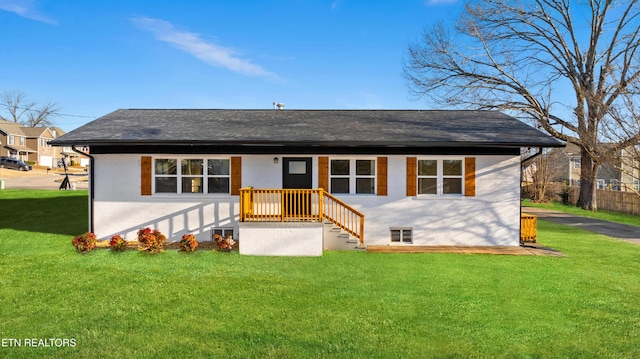 single story home featuring a front yard