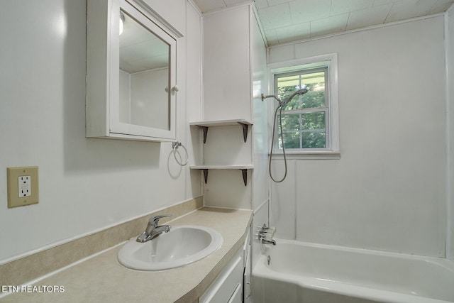 bathroom with shower / bathtub combination and vanity