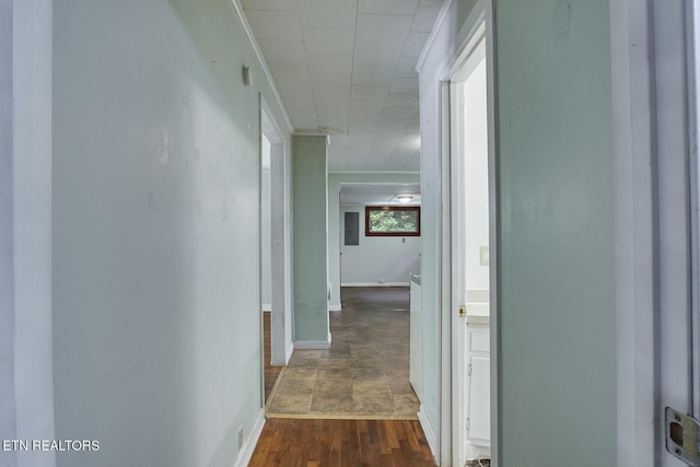 corridor with dark hardwood / wood-style floors