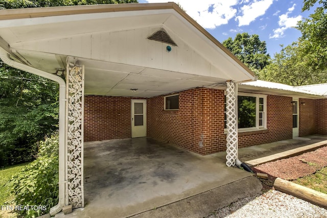 exterior space featuring a carport