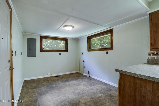 laundry area featuring a wealth of natural light and electric panel