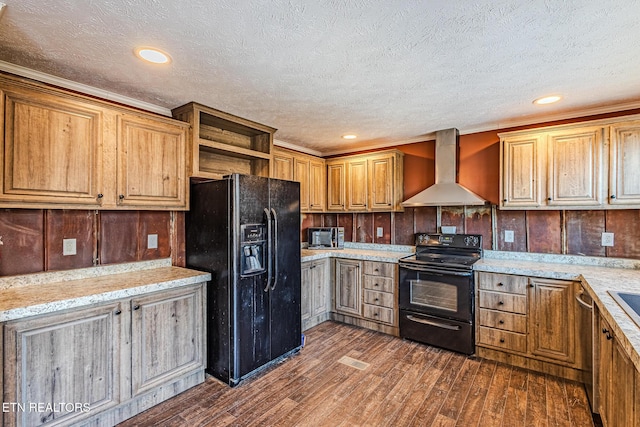 kitchen with wall chimney range hood, dark hardwood / wood-style floors, light stone counters, black appliances, and a textured ceiling