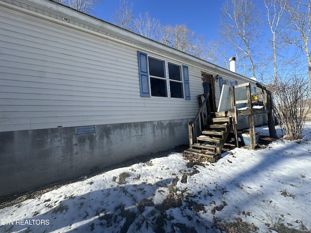 view of snowy exterior