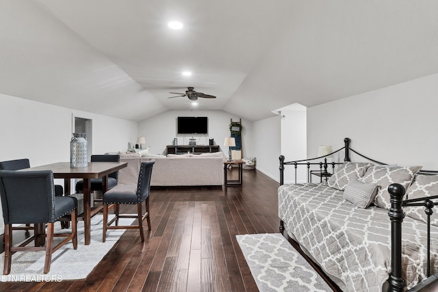 bedroom with lofted ceiling, ceiling fan, and dark wood-type flooring